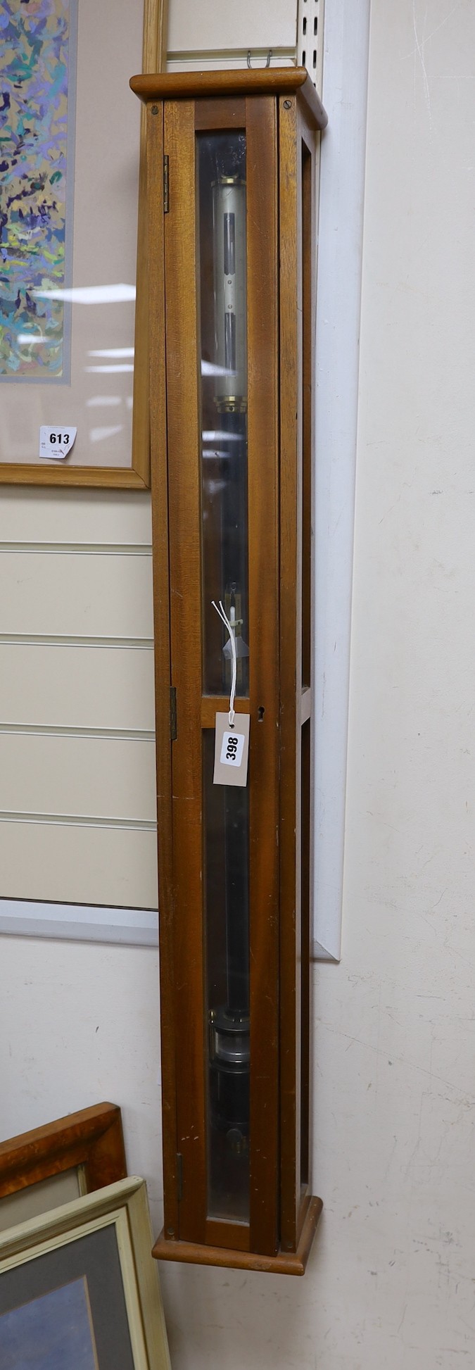 A marine barometer in a mahogany case, 118x17cm